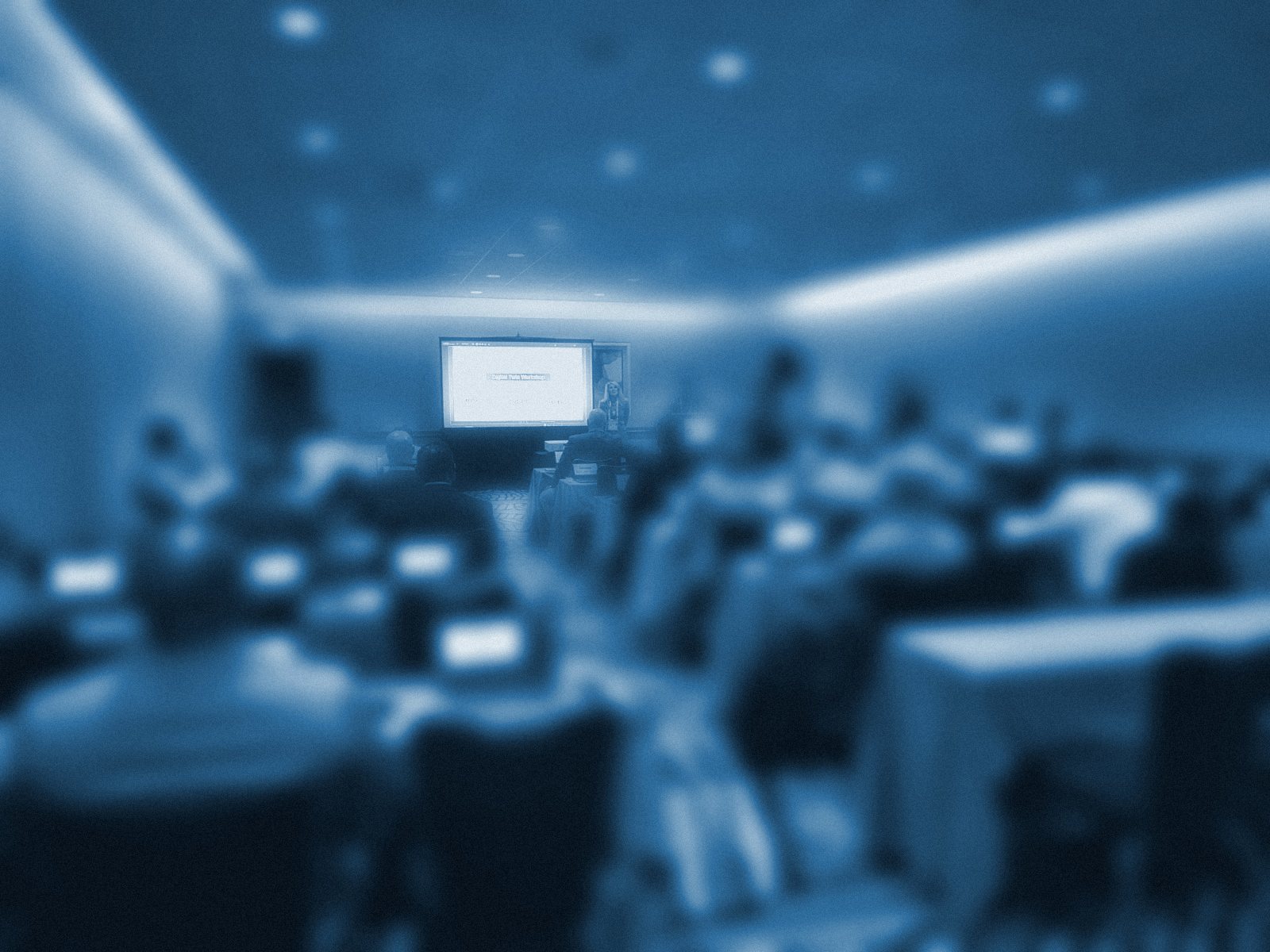 A full workshop room at I/ITSEC 2024, every attendee working on a laptop